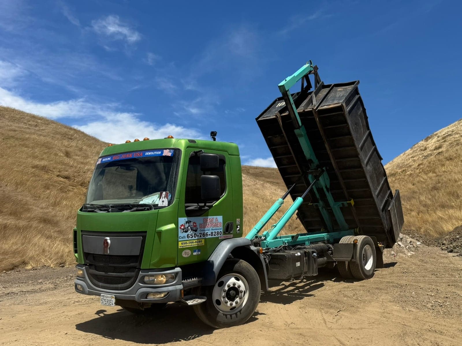 Big Junk USA branded truck on a job